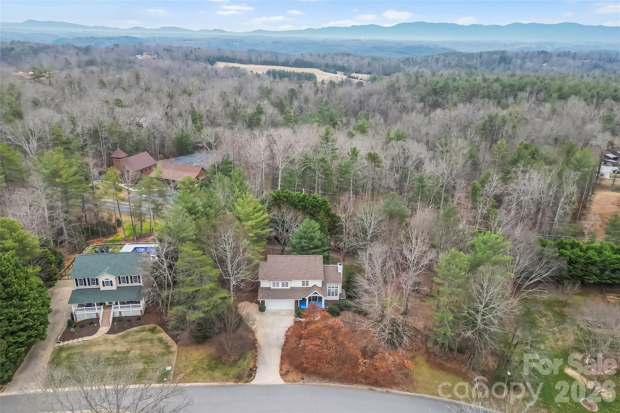 1726 Waterford Way Morganton, NC 28655 - Photo 38 of 45 an aerial view of a house with lots of trees