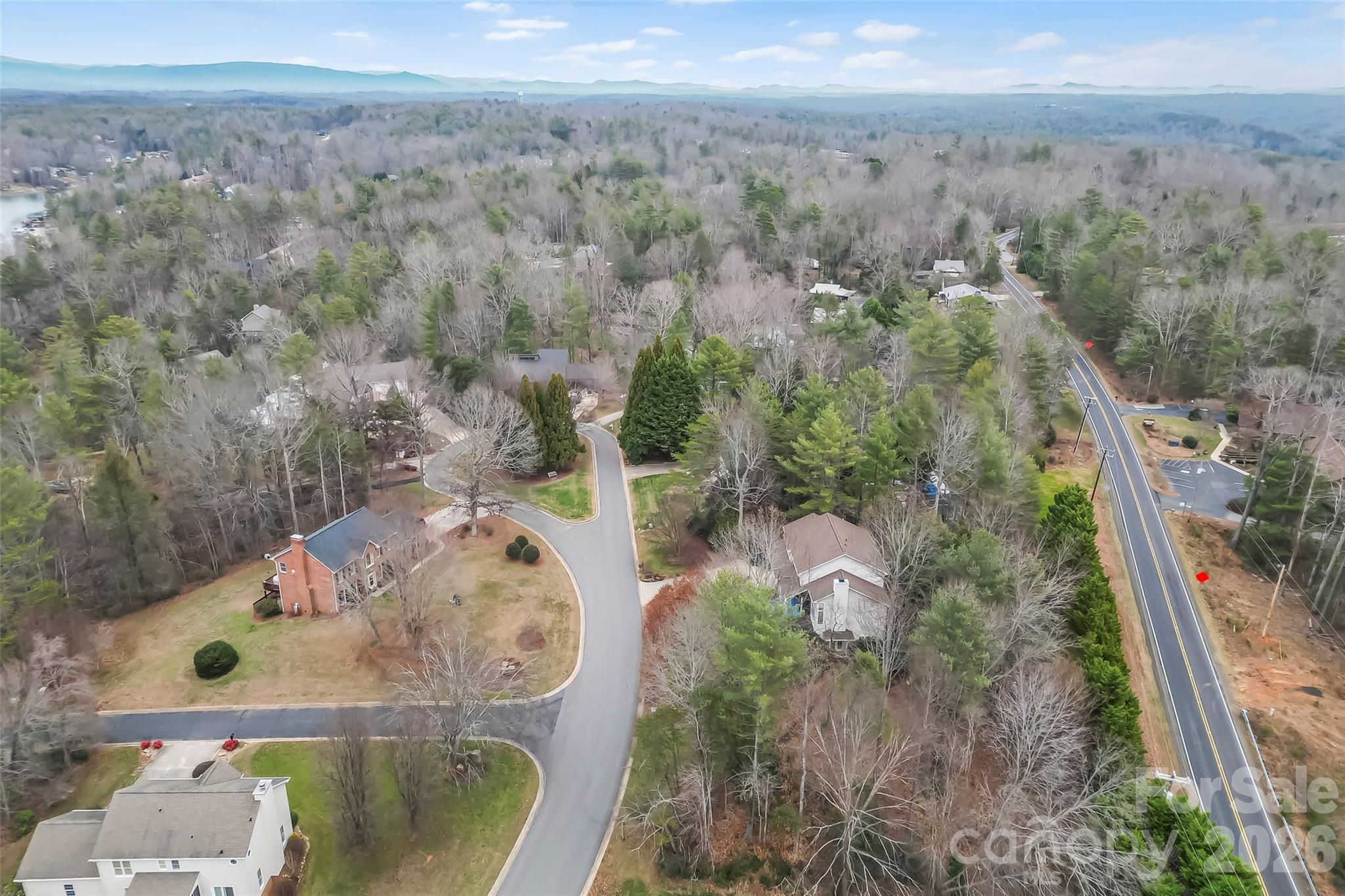 1726 Waterford Way Morganton, NC 28655 - Photo 39 of 45 an aerial view of a house with a yard and mountain