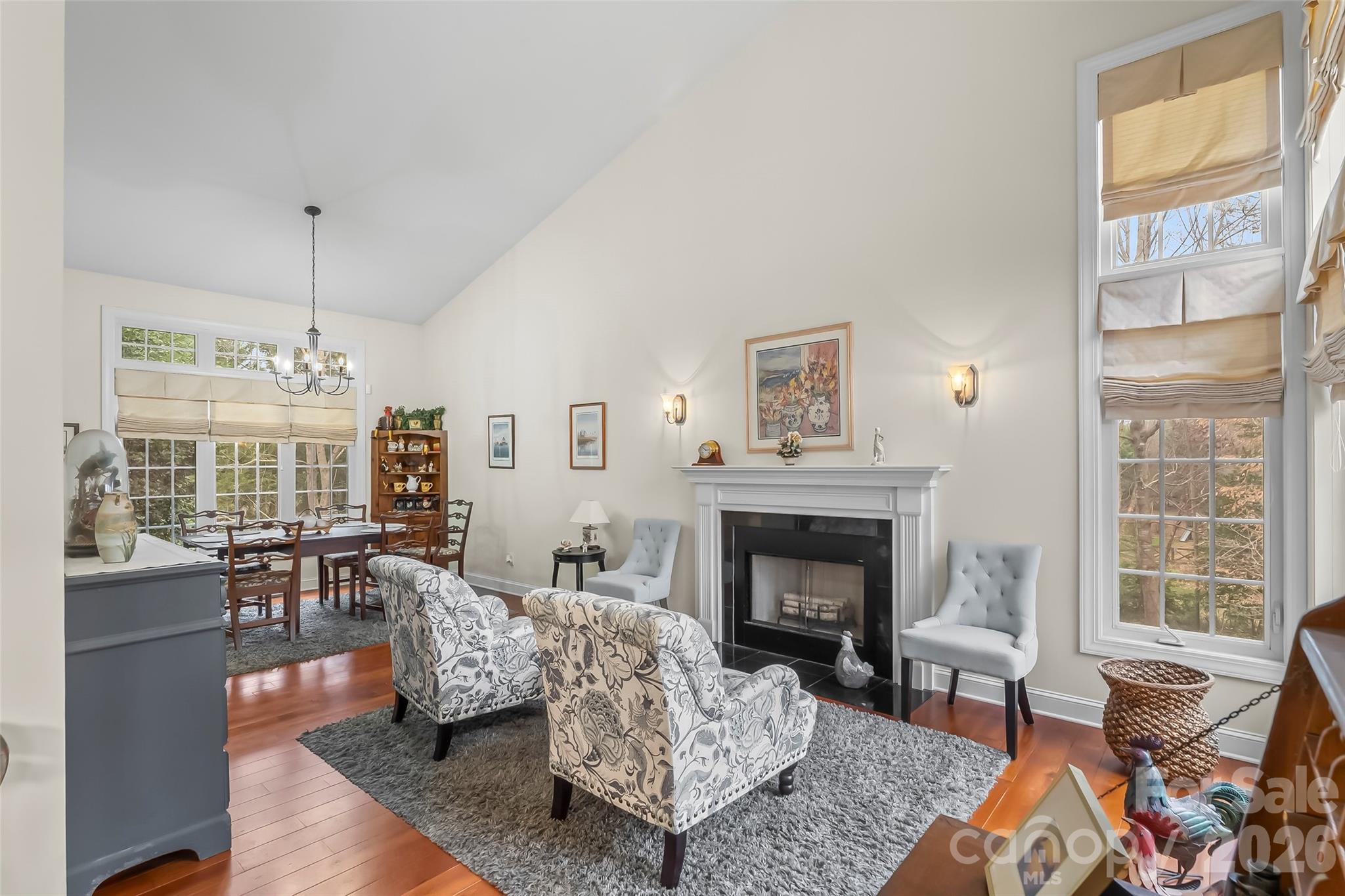 1726 Waterford Way Morganton, NC 28655 - Photo 5 of 45 a living room with furniture fireplace and a table