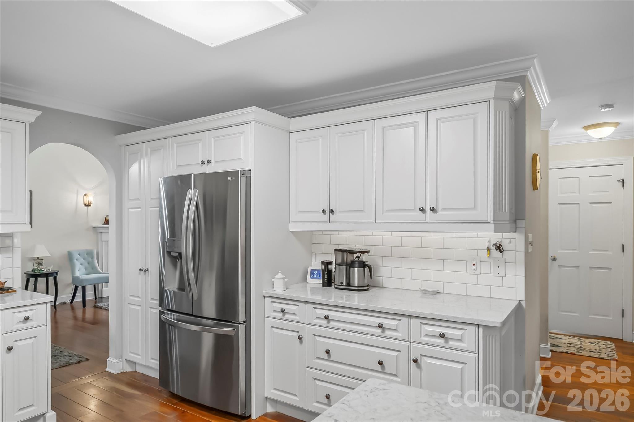 1726 Waterford Way Morganton, NC 28655 - Photo 10 of 45 a kitchen with stainless steel appliances granite countertop a refrigerator sink and cabinets
