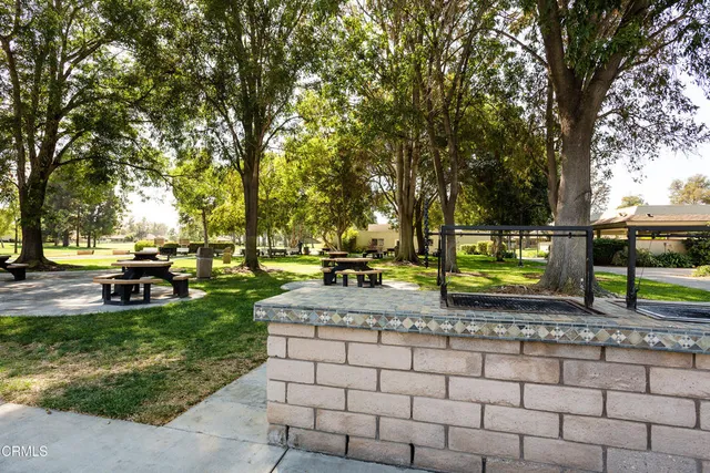 a view of swimming pool with outdoor seating