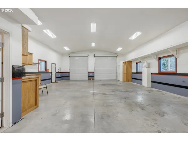 a view of kitchen with furniture and window