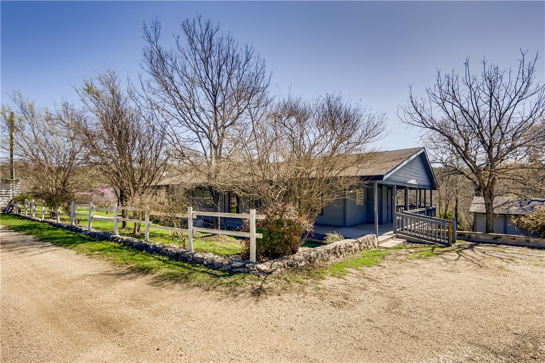 23114 Nameless Road Leander, TX 78641 - Photo 1 of 1 a view of a house with a snow in a yard