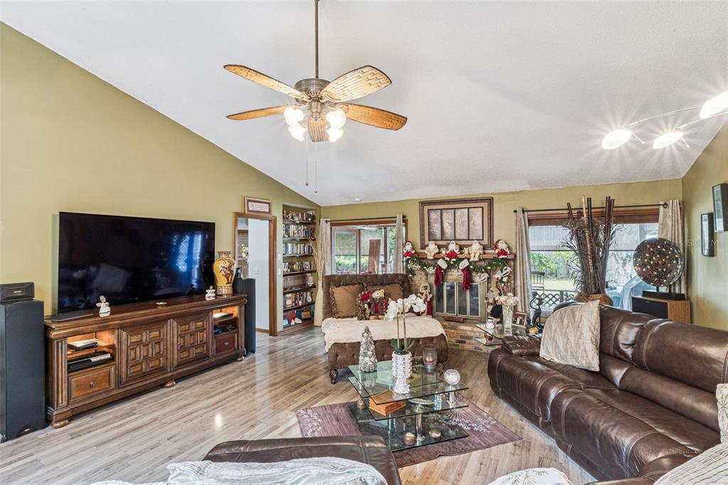 611 North Forsyth Road Orlando, FL 32807 - Photo 20 of 36 a living room with furniture and a flat screen tv