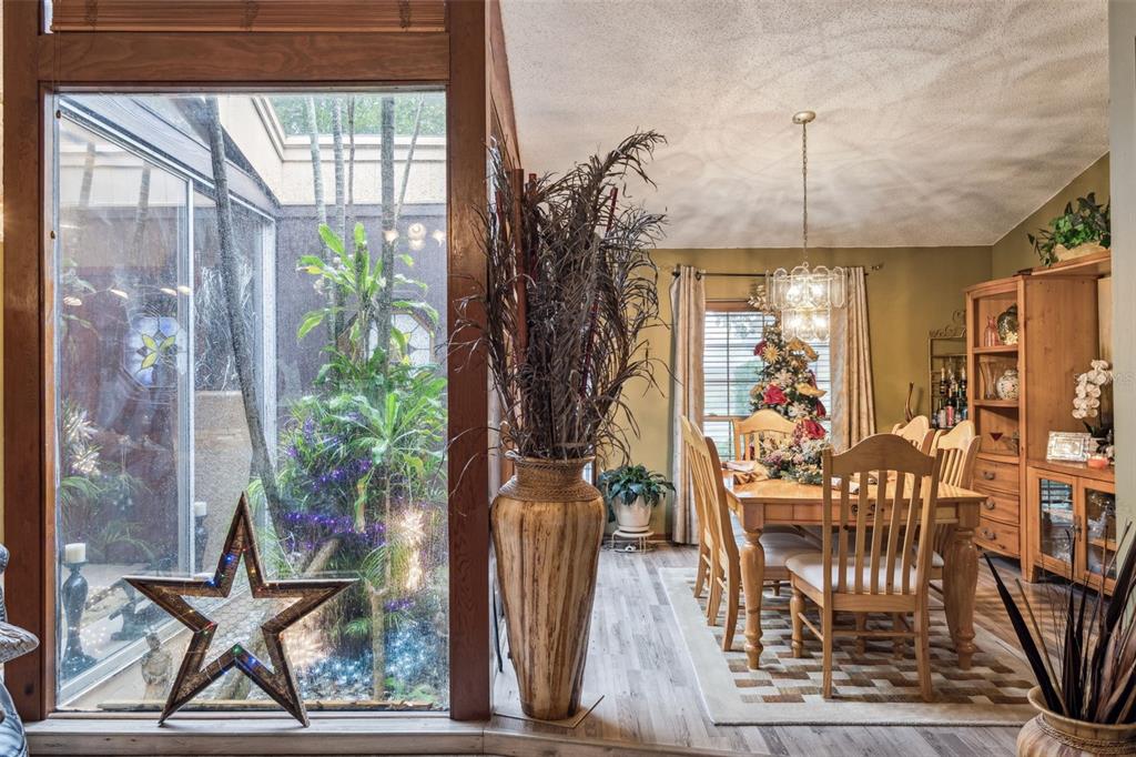 611 North Forsyth Road Orlando, FL 32807 - Photo 23 of 36 a view of a dining room with furniture window and outside view