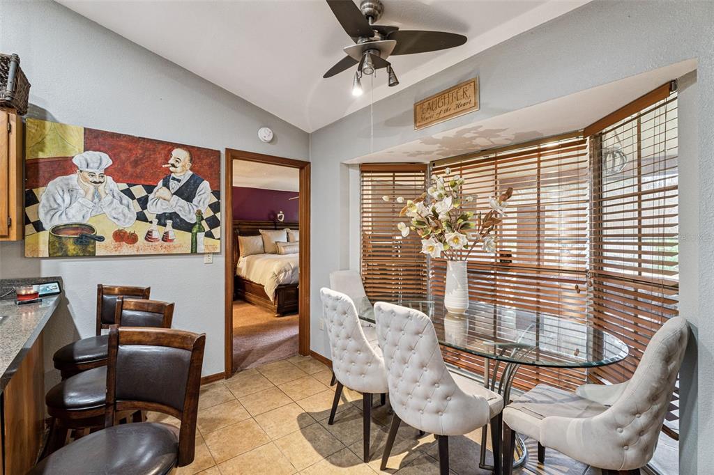 611 North Forsyth Road Orlando, FL 32807 - Photo 10 of 36 a view of a livingroom with workspace and a window