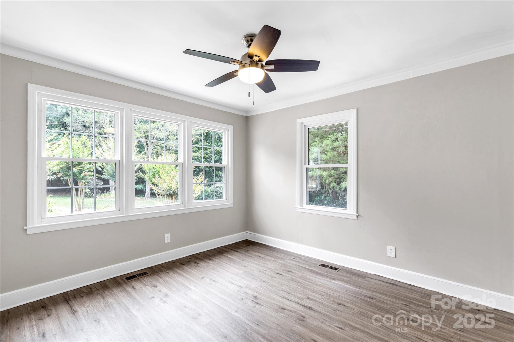 1641 Converse Street Lancaster, SC 29720 - Photo 14 of 33 a view of an empty room with wooden floor and a window