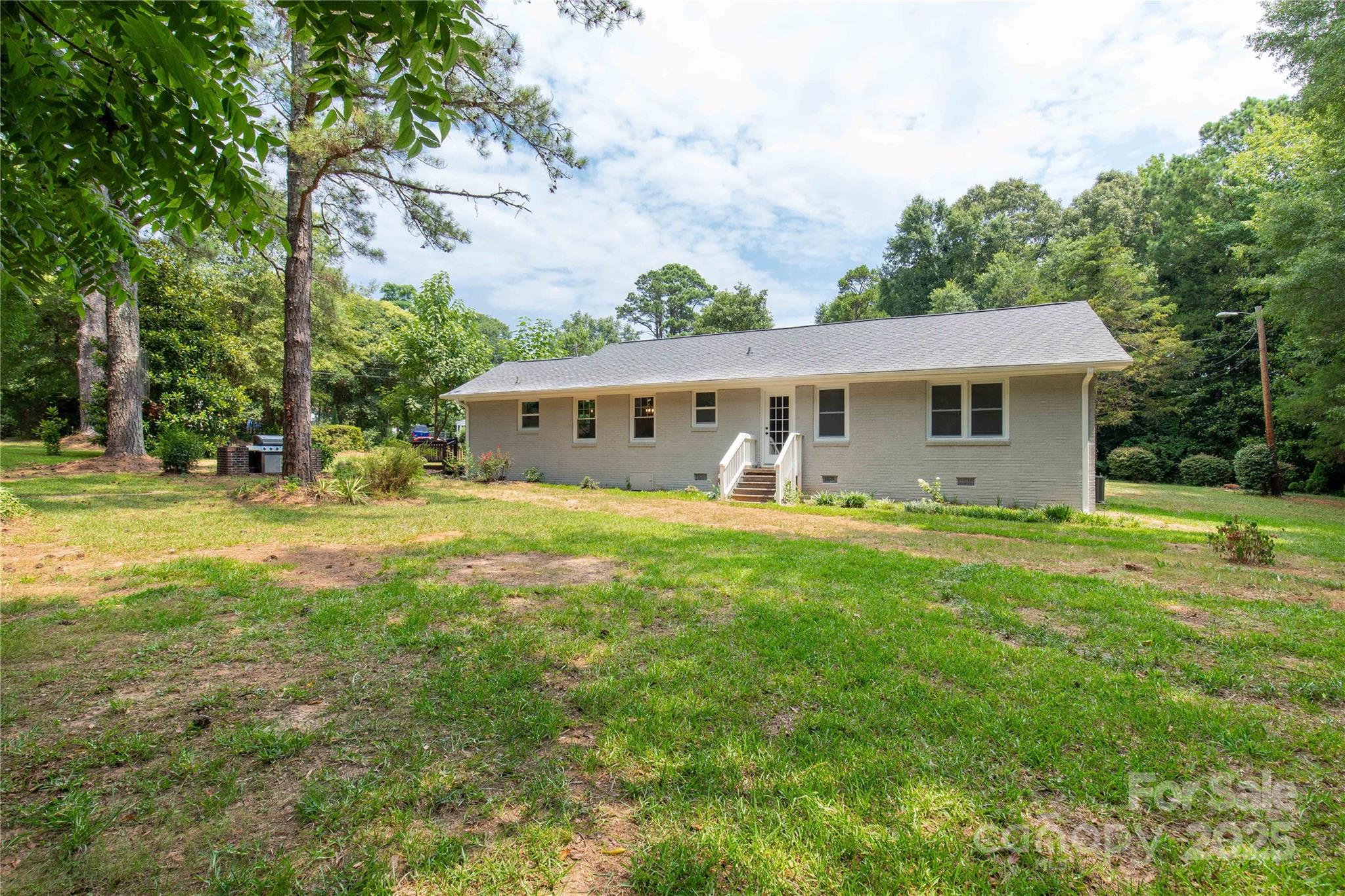 1641 Converse Street Lancaster, SC 29720 - Photo 25 of 33 a view of a house with a backyard