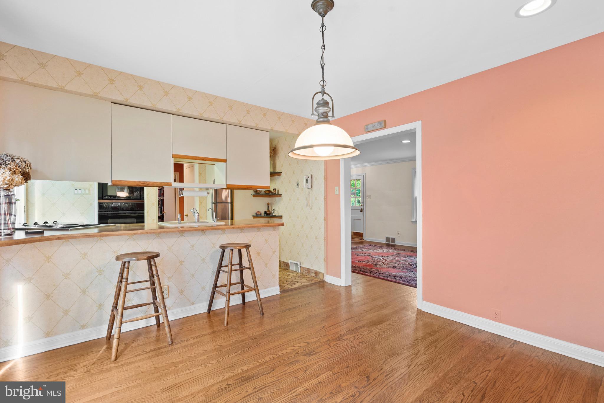 610 Broad Acres Road Penn Valley, PA 19072 - Photo 11 of 41 a view of a dining room with furniture and wooden floor