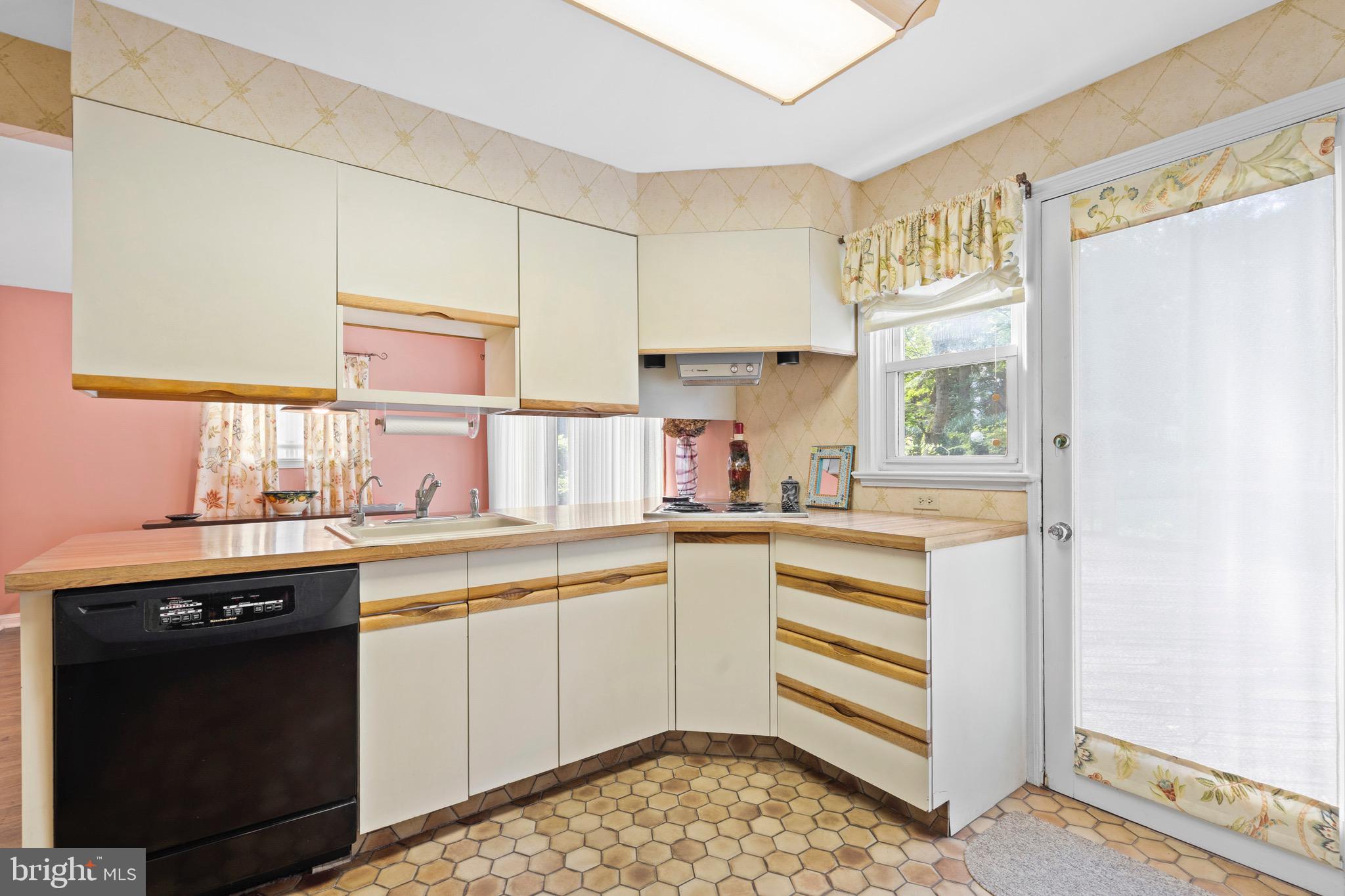 610 Broad Acres Road Penn Valley, PA 19072 - Photo 13 of 41 a kitchen with a sink and cabinets