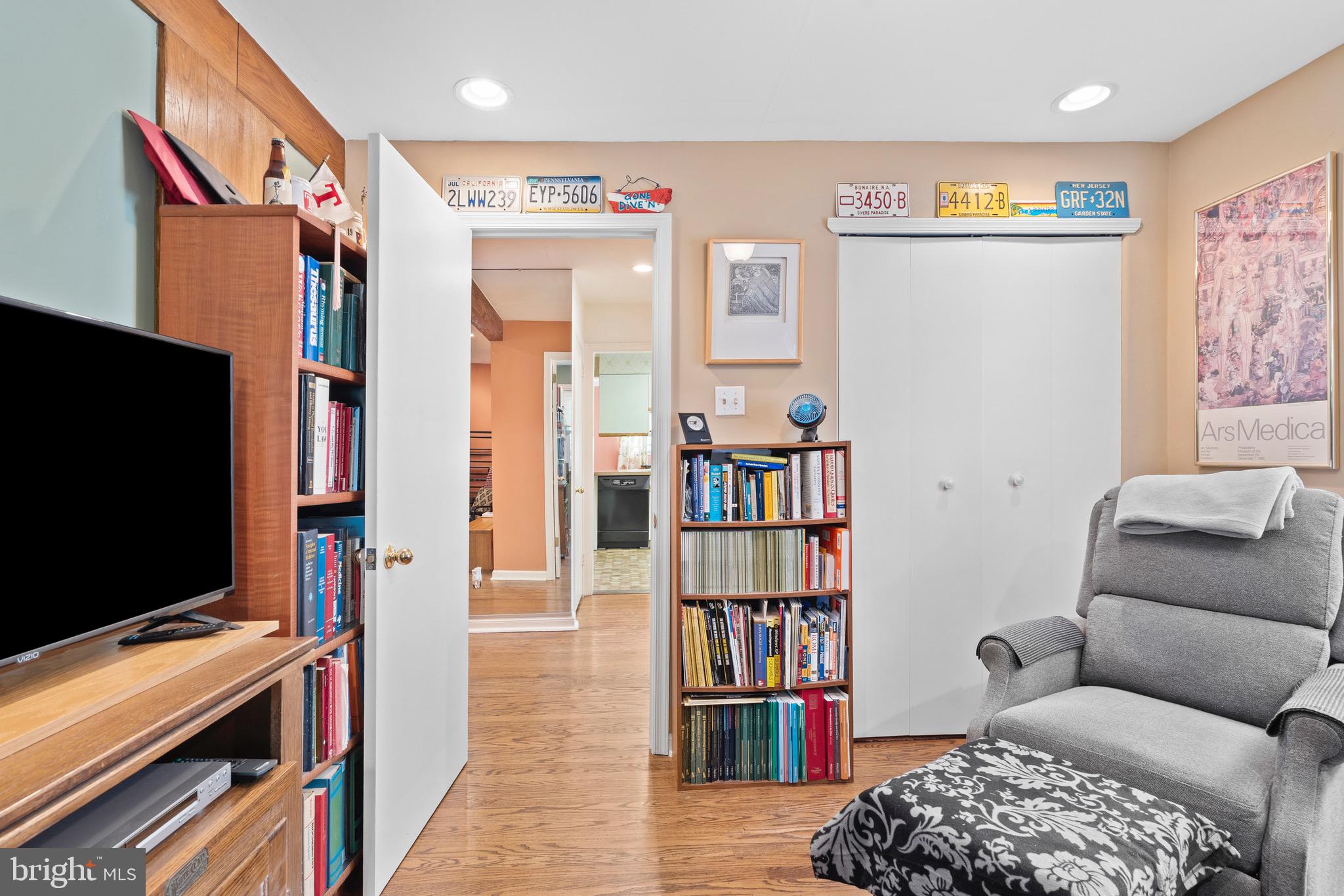 610 Broad Acres Road Penn Valley, PA 19072 - Photo 16 of 41 a living room with furniture and a flat screen tv