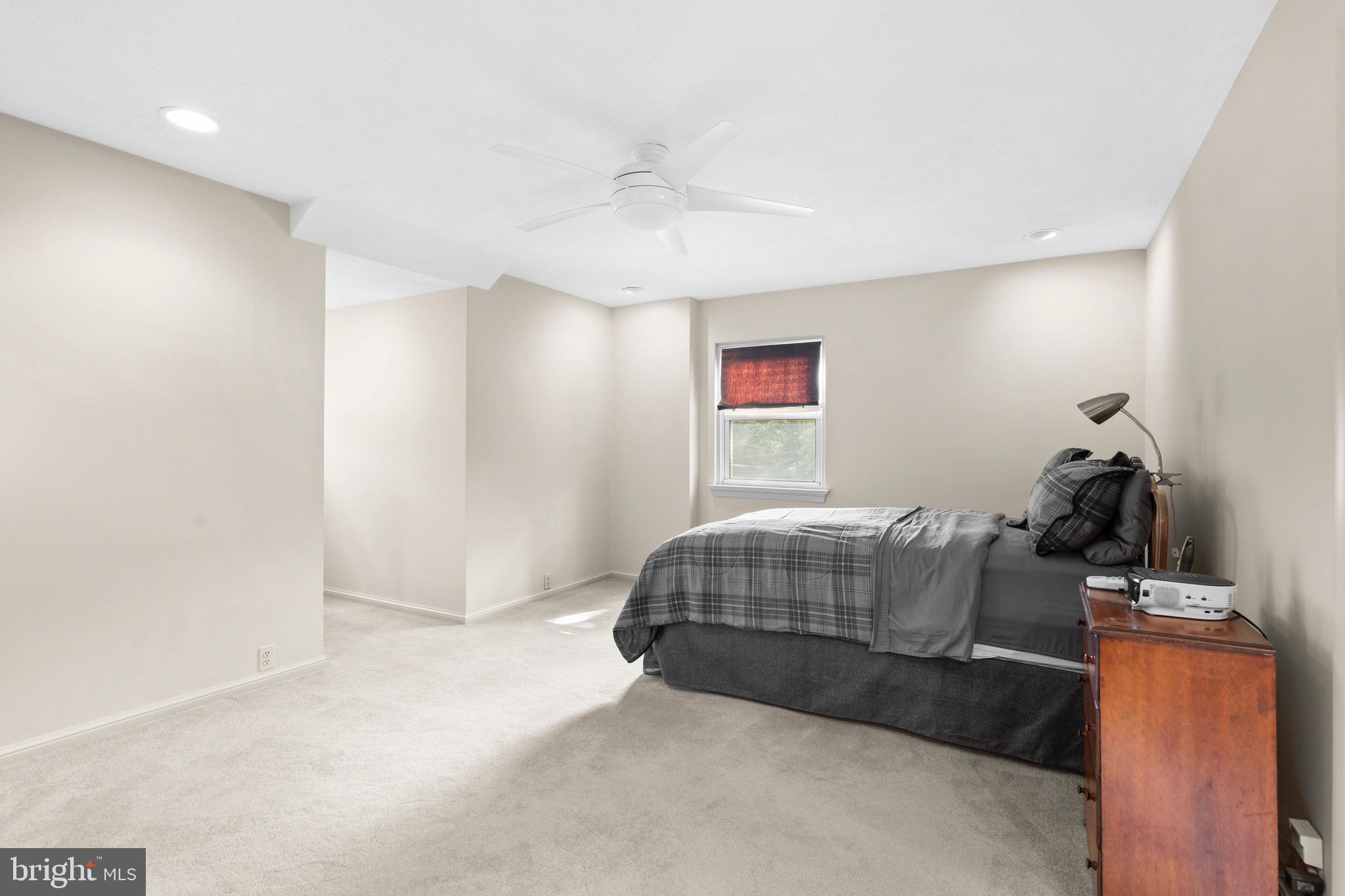 610 Broad Acres Road Penn Valley, PA 19072 - Photo 19 of 41 a living room with furniture and a flat screen tv