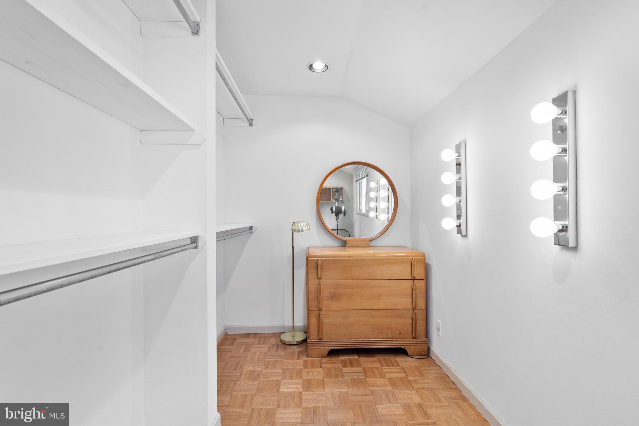 610 Broad Acres Road Penn Valley, PA 19072 - Photo 22 of 41 a room with a cabinet and mirror