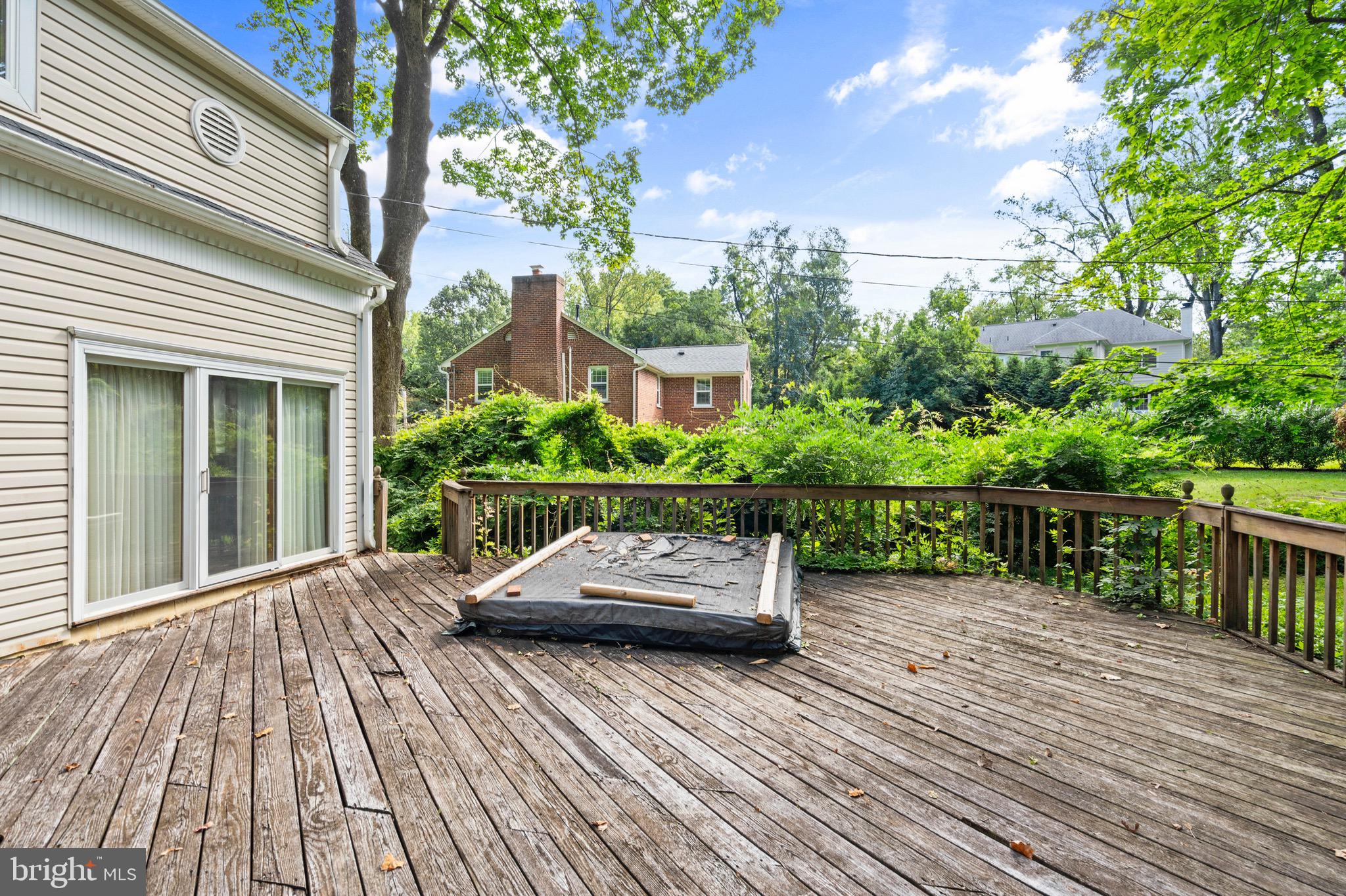 610 Broad Acres Road Penn Valley, PA 19072 - Photo 30 of 41 a view of a deck with chair and table with wooden floor and fence