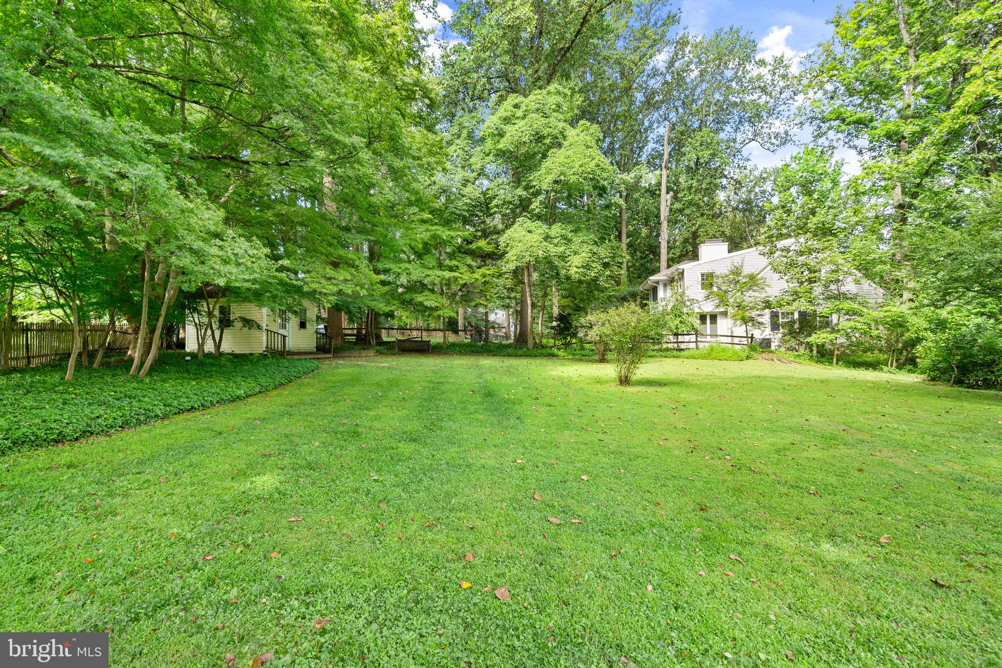 610 Broad Acres Road Penn Valley, PA 19072 - Photo 36 of 41 a backyard of a house with lots of green space