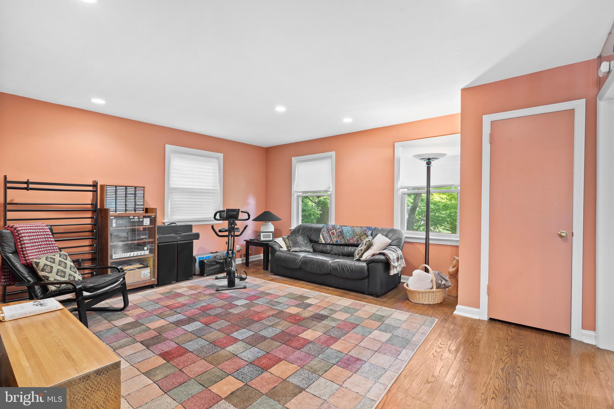 610 Broad Acres Road Penn Valley, PA 19072 - Photo 7 of 41 a living room with furniture and a flat screen tv