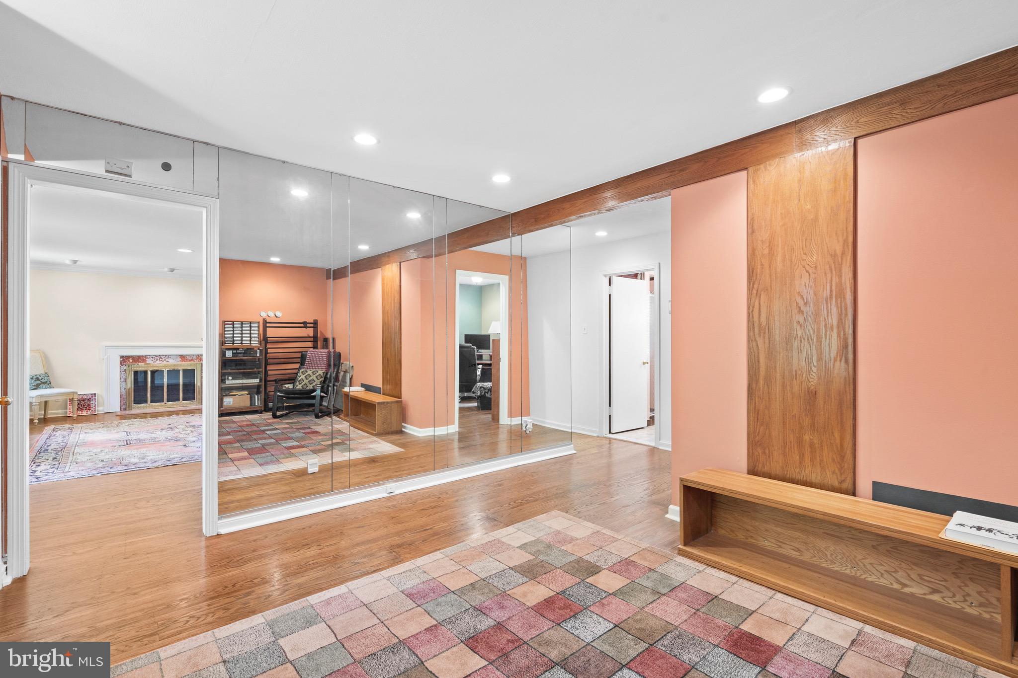 610 Broad Acres Road Penn Valley, PA 19072 - Photo 9 of 41 a view of a hallway with wooden floor and furniture