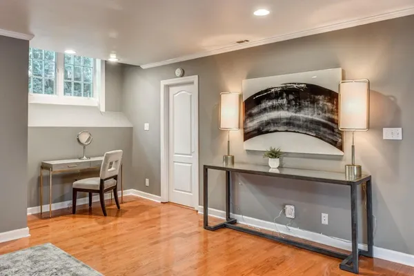 a view of a livingroom with furniture and window