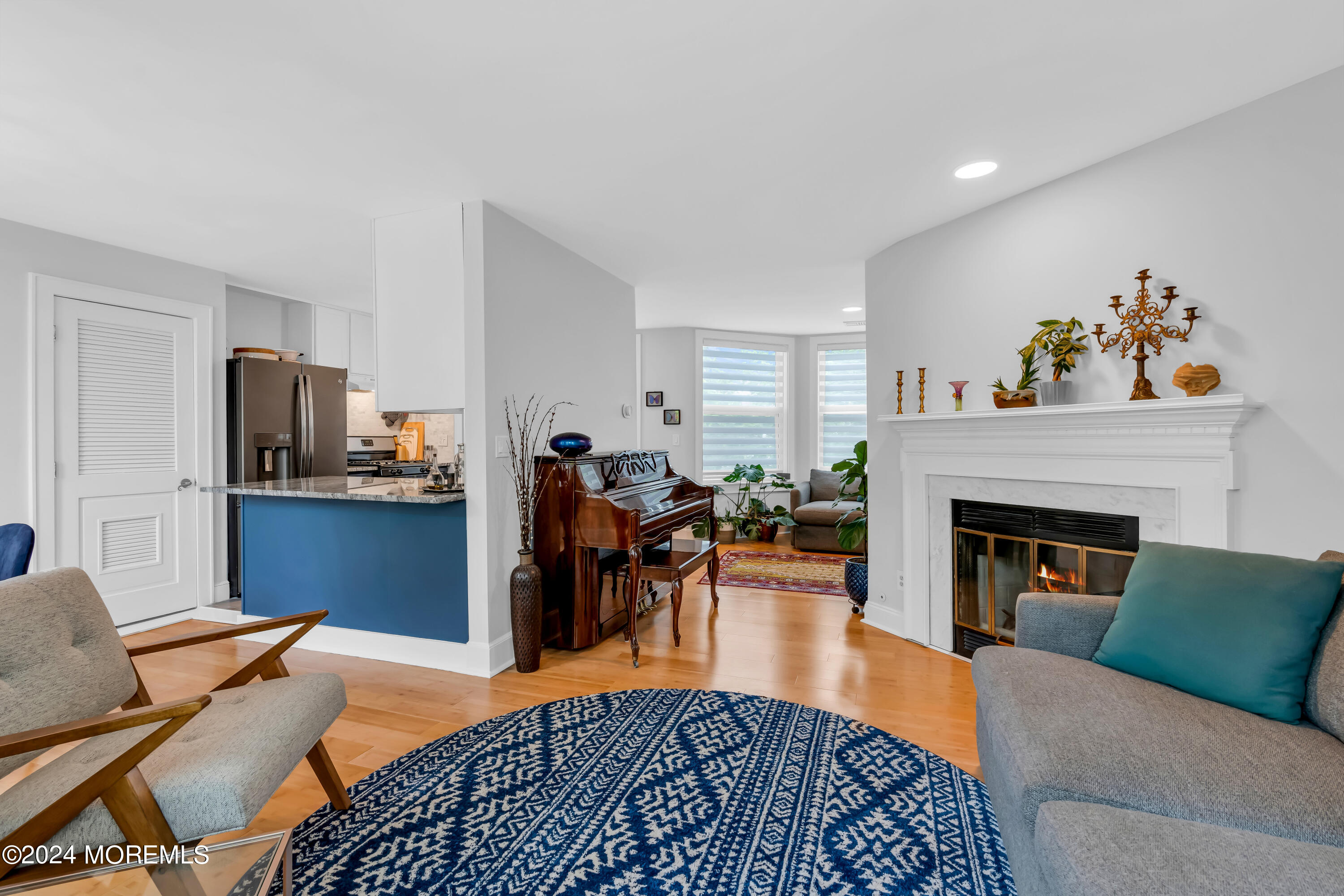 100 1st Street, Unit 8 Keyport, NJ 07735 - Photo 20 of 55 a living room with furniture and a fireplace