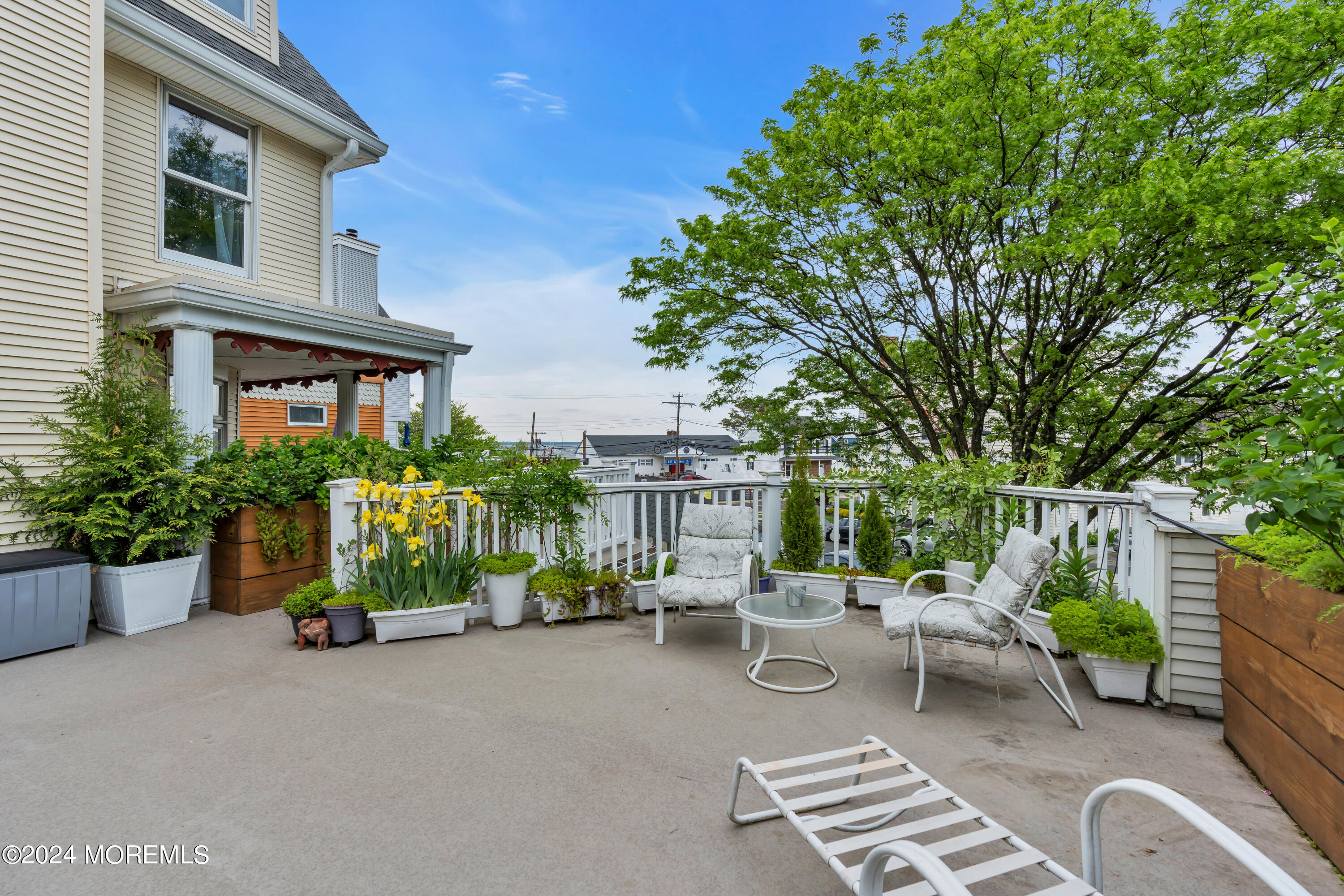 100 1st Street, Unit 8 Keyport, NJ 07735 - Photo 27 of 55 a view of backyard with outdoor seating and plants