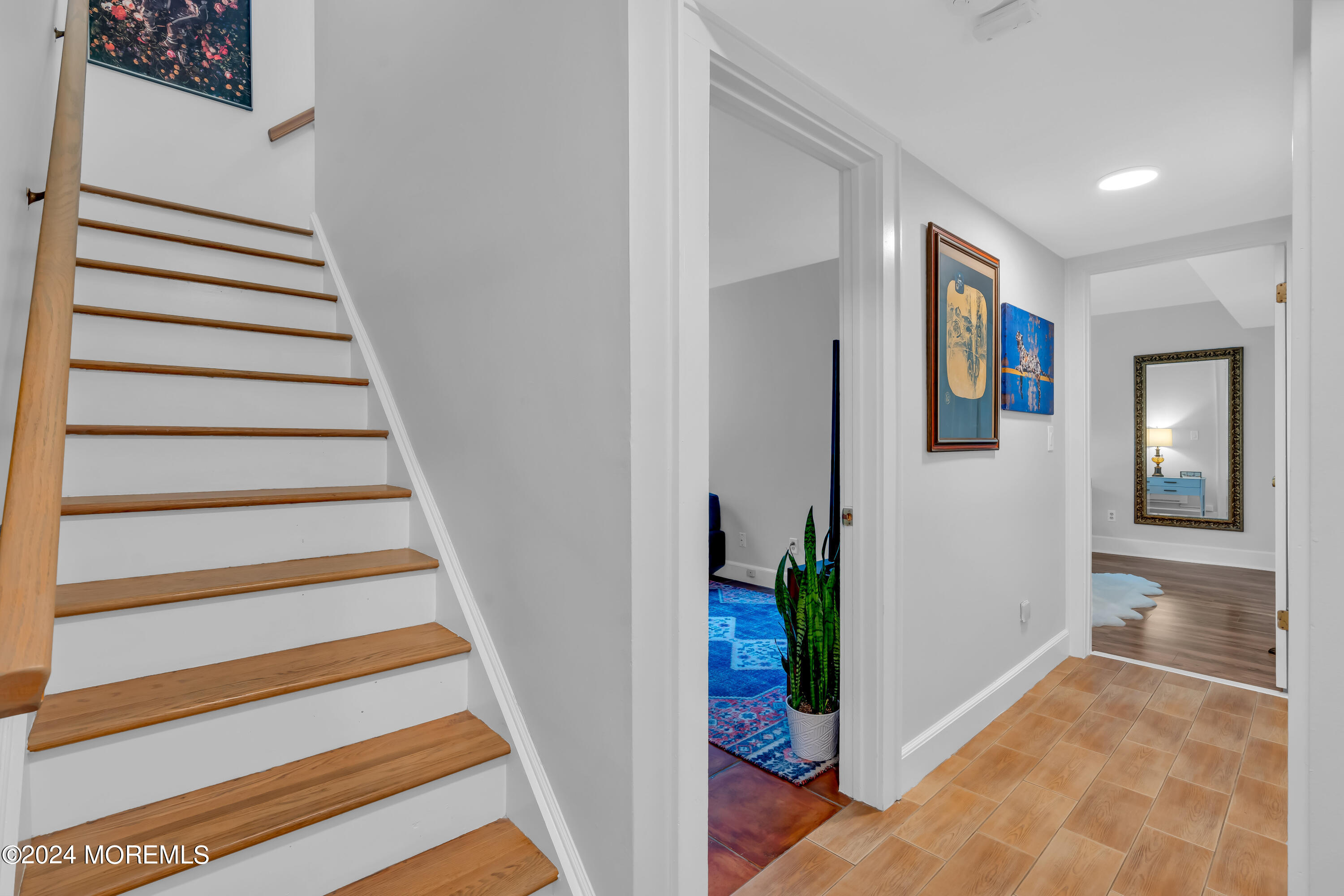 100 1st Street, Unit 8 Keyport, NJ 07735 - Photo 3 of 55 a view of a hallway with wooden floor and entryway
