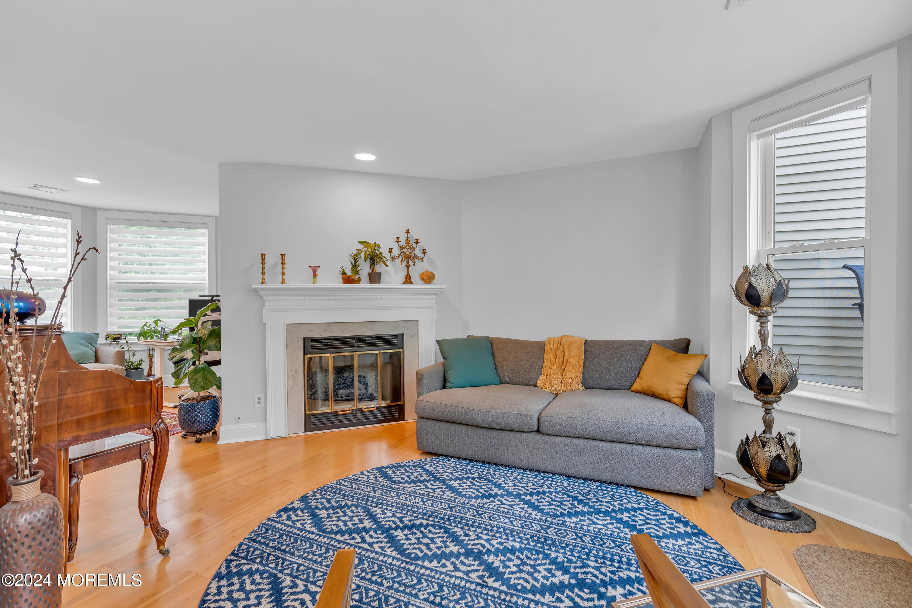 100 1st Street, Unit 8 Keyport, NJ 07735 - Photo 50 of 55 a living room with furniture and a fireplace