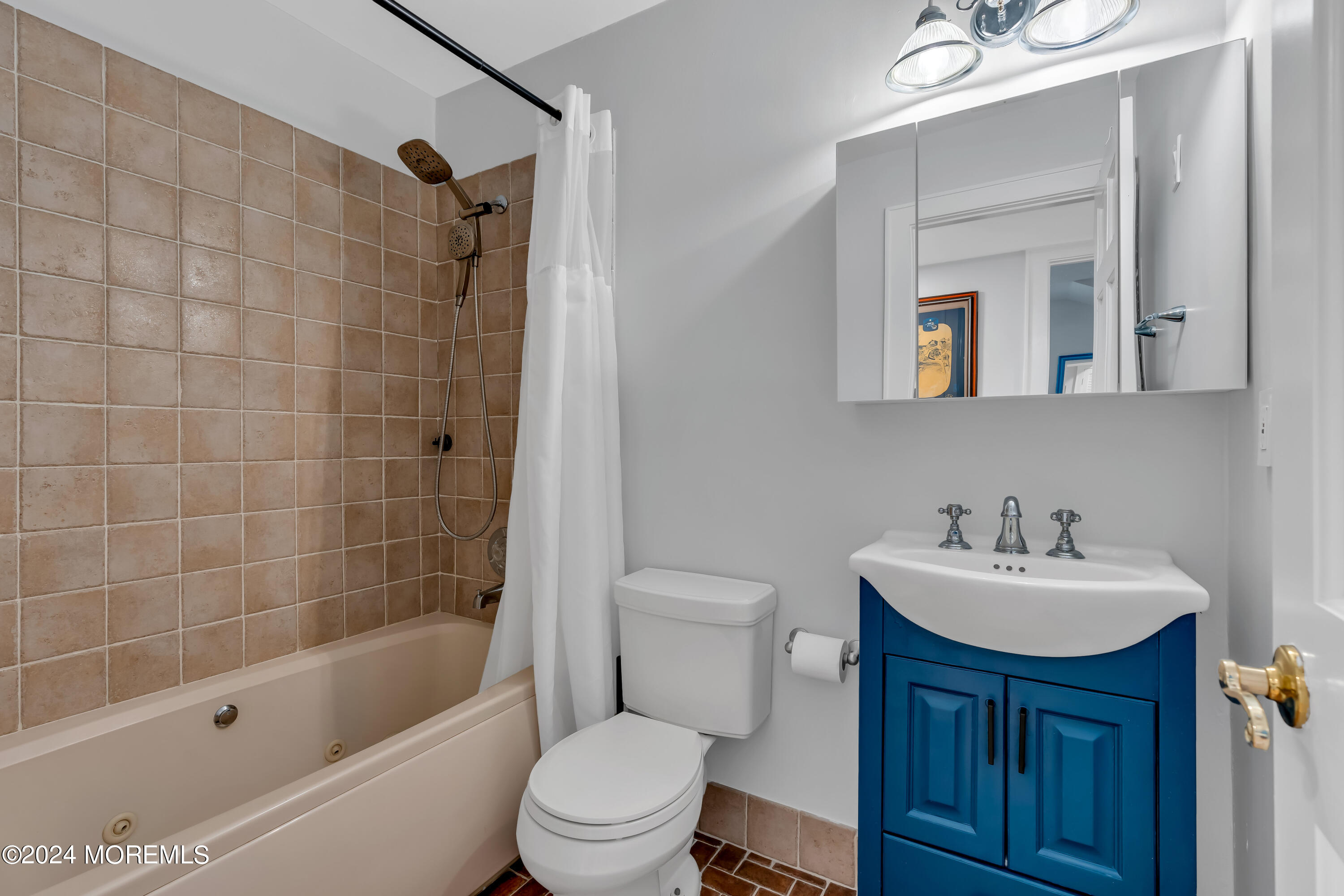 100 1st Street, Unit 8 Keyport, NJ 07735 - Photo 6 of 55 a bathroom with a sink a toilet and shower