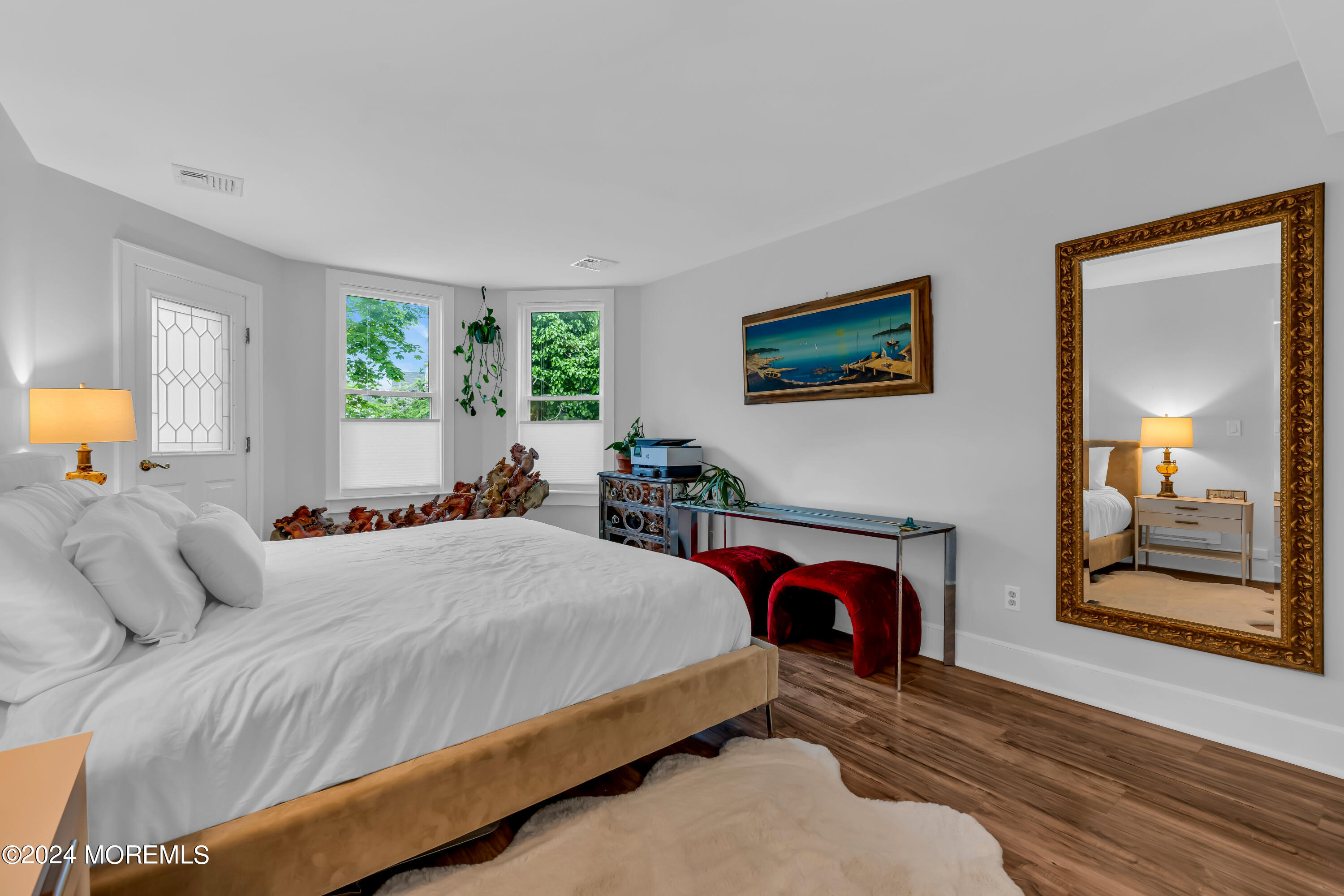 100 1st Street, Unit 8 Keyport, NJ 07735 - Photo 7 of 55 a bedroom with a bed and a flat screen tv