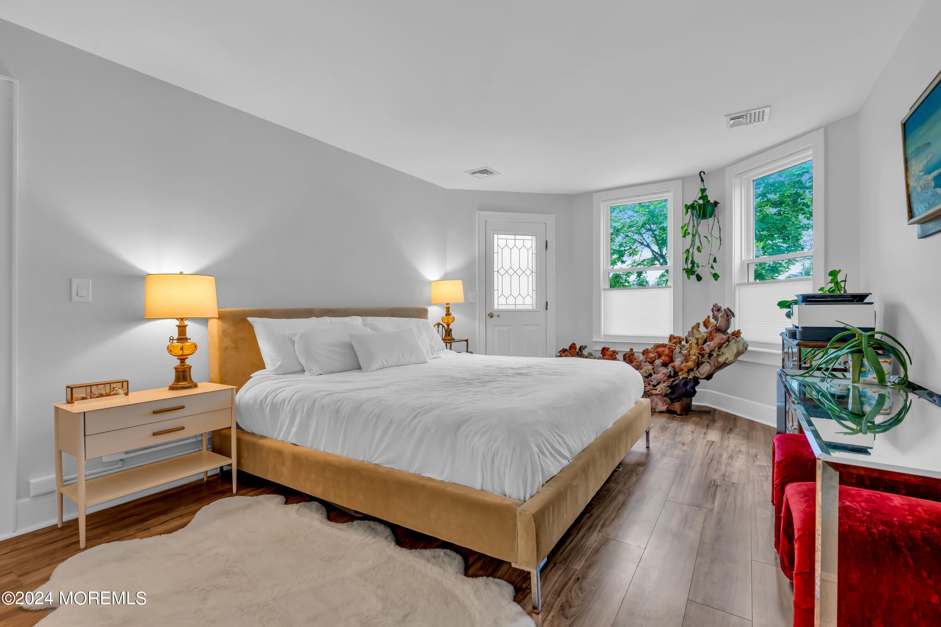 100 1st Street, Unit 8 Keyport, NJ 07735 - Photo 8 of 55 a spacious bedroom with a bed and windows