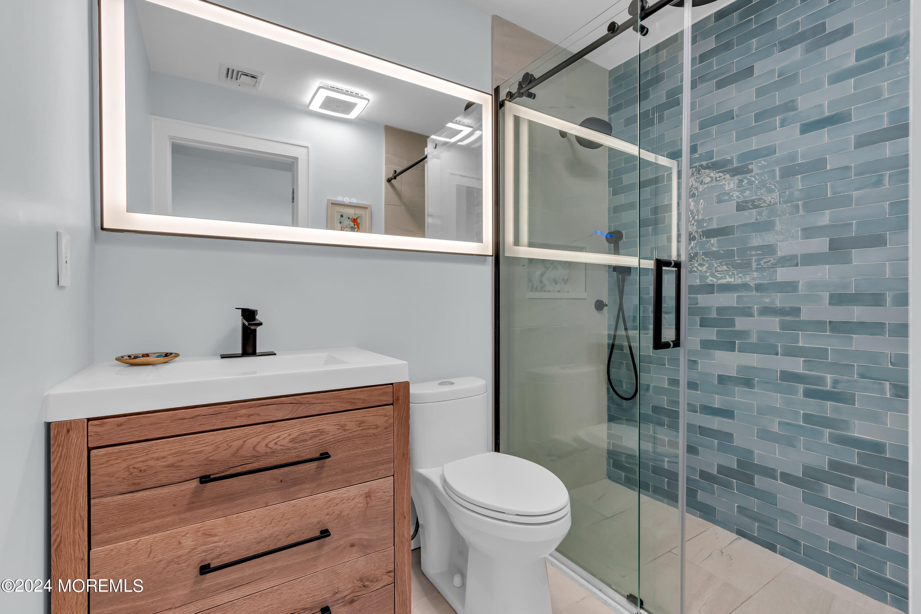 100 1st Street, Unit 8 Keyport, NJ 07735 - Photo 10 of 55 a bathroom with a toilet sink vanity and shower