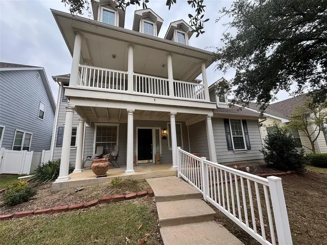 a view of a house with a porch
