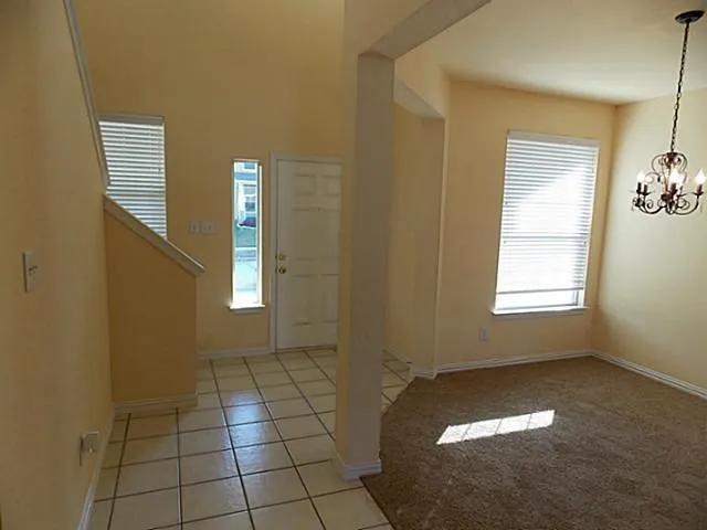 a view of an empty room with window