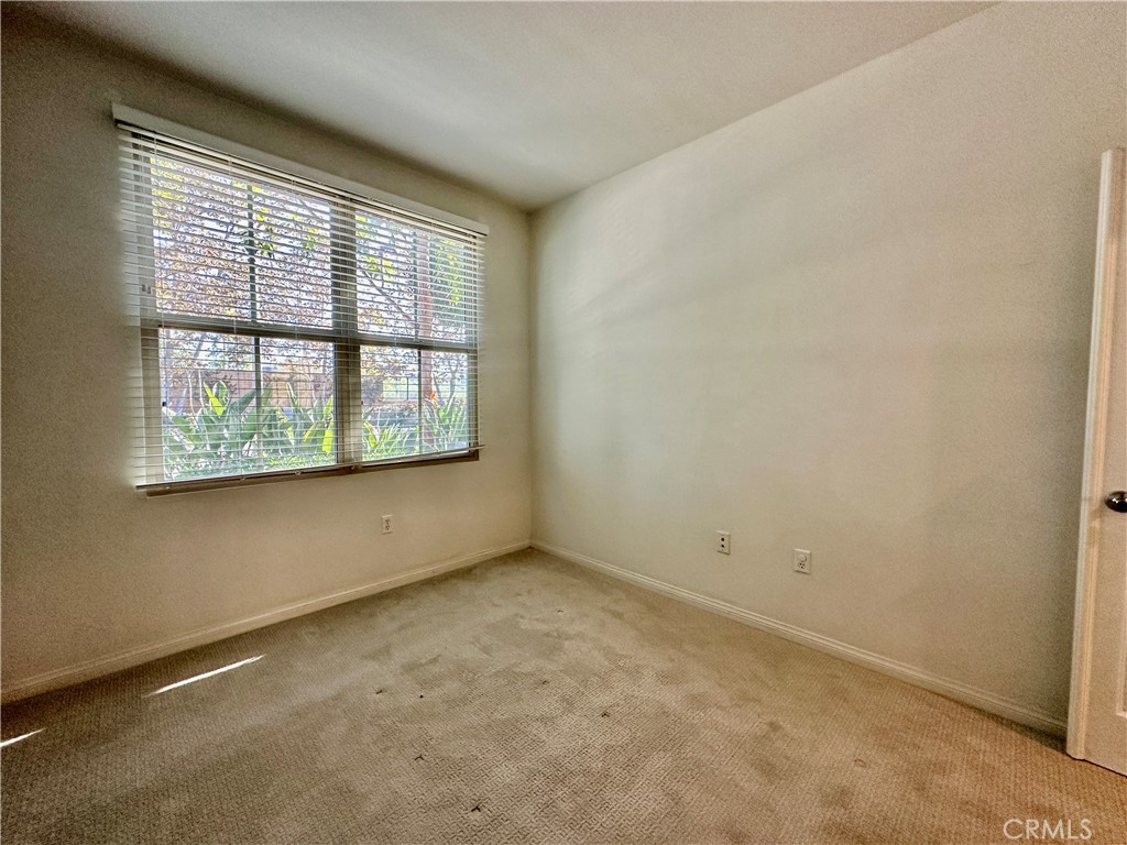 18 Serenity Irvine, CA 92618 - Photo 12 of 14 an empty room with a window
