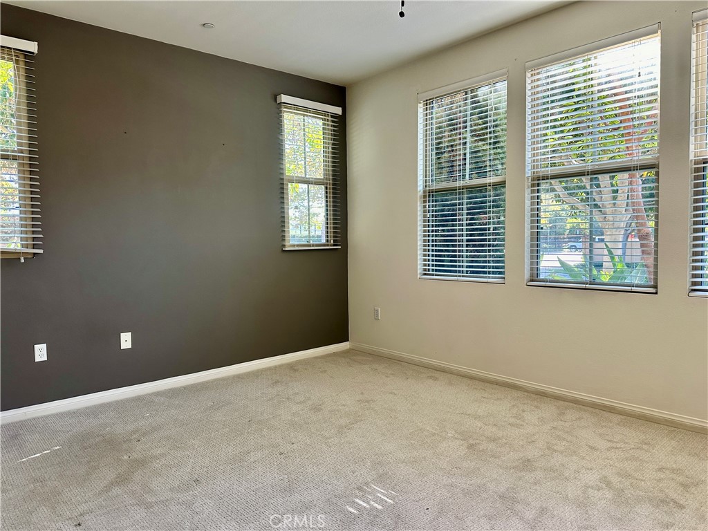 18 Serenity Irvine, CA 92618 - Photo 10 of 14 a view of an empty room with a window