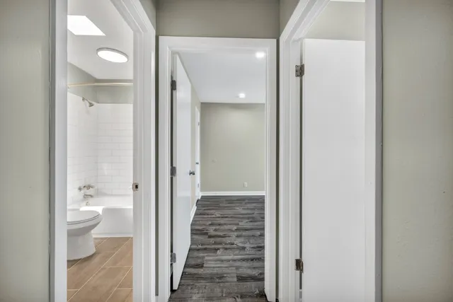 a bathroom view of a toilet and a view of bathroom