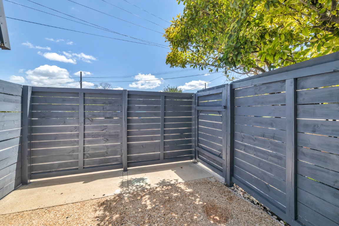 2808 Skyway Circle, Unit 101 Austin, TX 78704 - Photo 22 of 25 a view of a wooden door and a tree