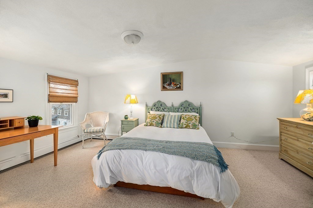 7 Hawthorne Lane Gloucester, MA 01930 - Photo 18 of 24 a bedroom with a bed and a couch