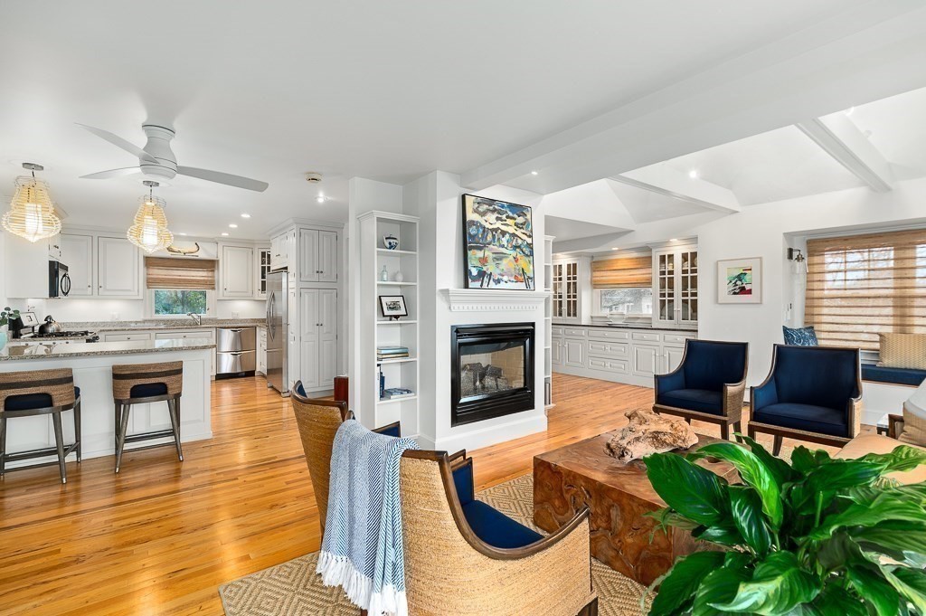 7 Hawthorne Lane Gloucester, MA 01930 - Photo 10 of 24 a living room with fireplace furniture and a wooden floor