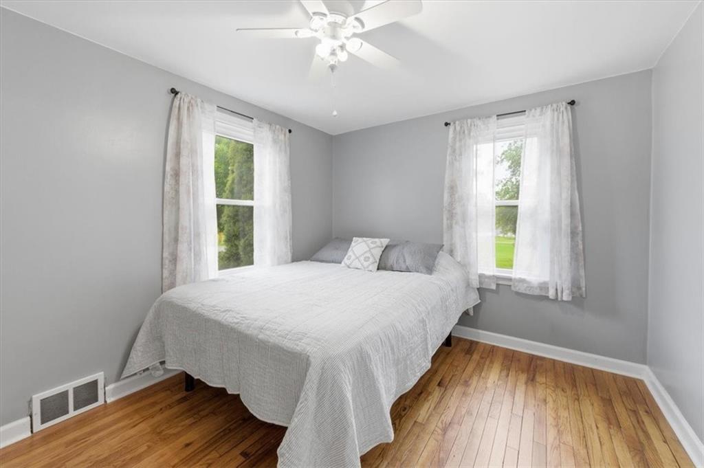 344 Winfield Road Cabot, PA 16023 - Photo 13 of 30 a bedroom with a bed and a window