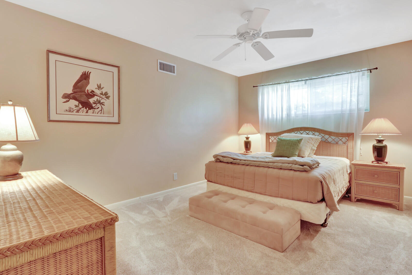 390 North Juno Lane Juno Beach, FL 33408 - Photo 31 of 33 a bedroom with a bed and window