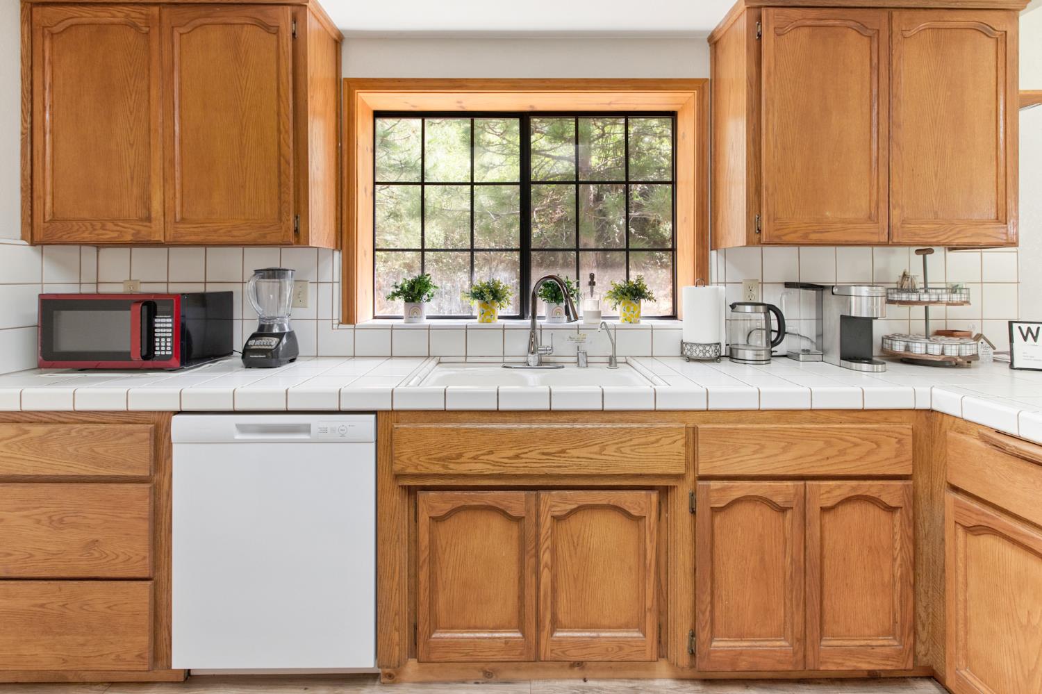 52865 Highway 245 Miramonte, CA 93641 - Photo 13 of 50 a kitchen with stainless steel appliances granite countertop a sink a stove and cabinets