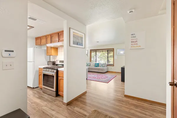 a bedroom with a bed and a desk