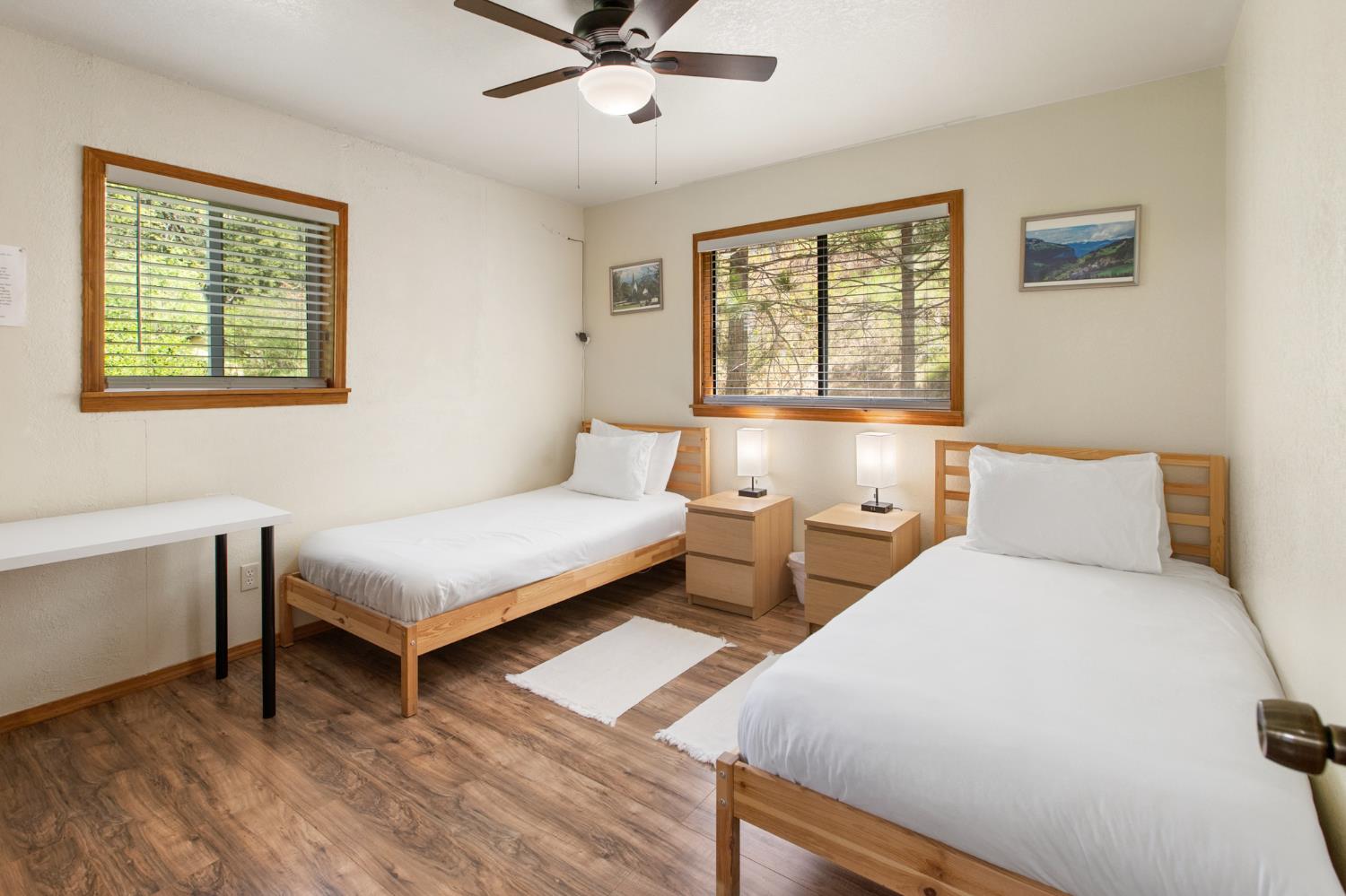 52865 Highway 245 Miramonte, CA 93641 - Photo 22 of 50 a bedroom with a bed and window