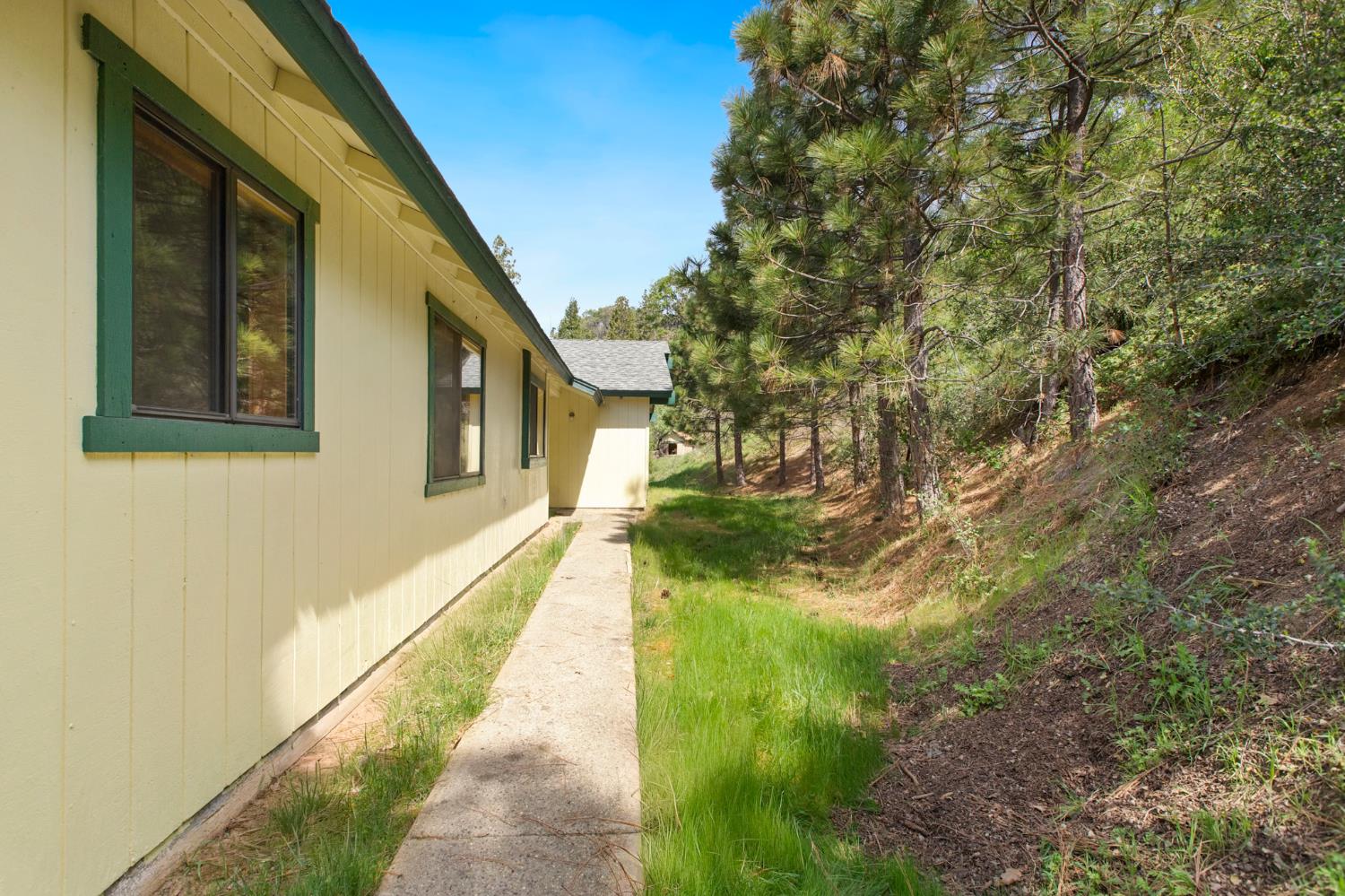 52865 Highway 245 Miramonte, CA 93641 - Photo 34 of 50 a path view of a house with a yard