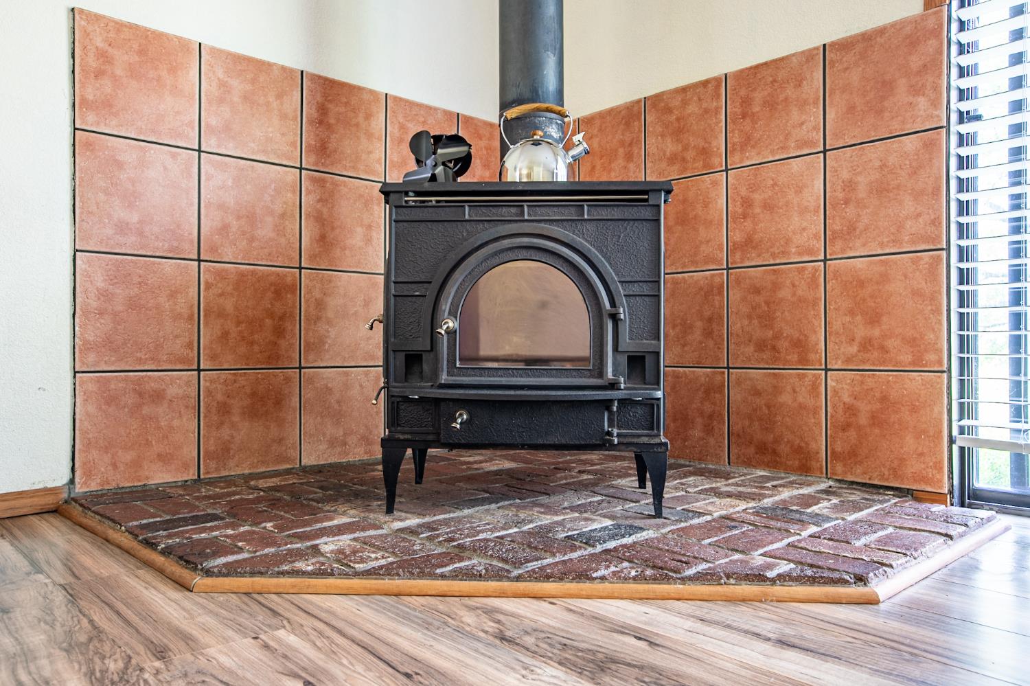 52865 Highway 245 Miramonte, CA 93641 - Photo 9 of 50 a close view of a sink and dishwasher with wooden floor
