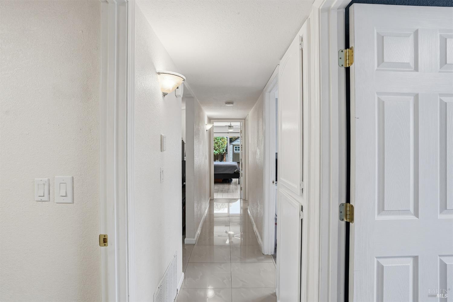 773 Blue Ridge Lane Vacaville, CA 95688 - Photo 23 of 44 a view of a hallway with wooden shelves