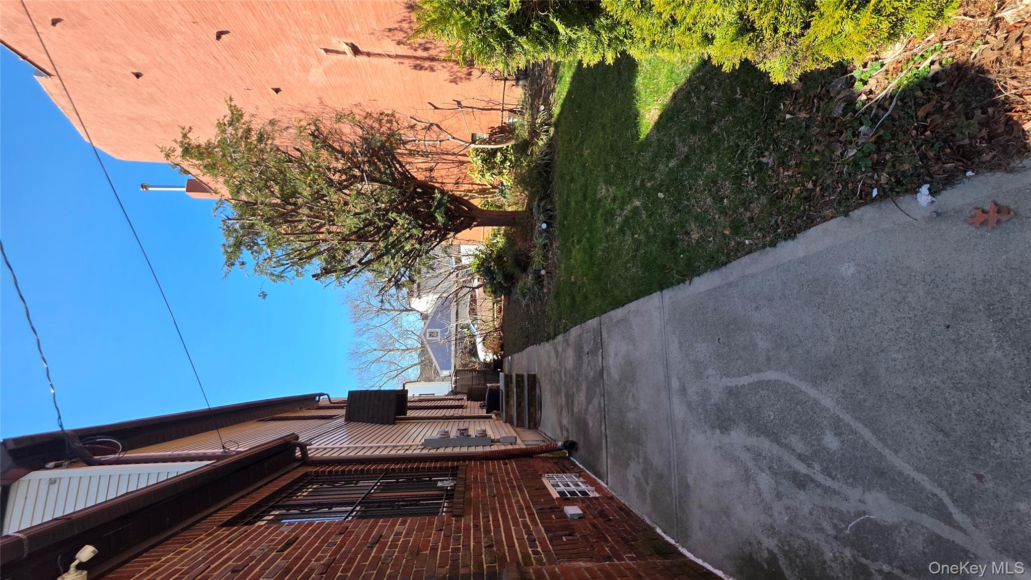 37-54 99th Street Queens, NY 11368 - Photo 16 of 18 a view of a backyard of the house