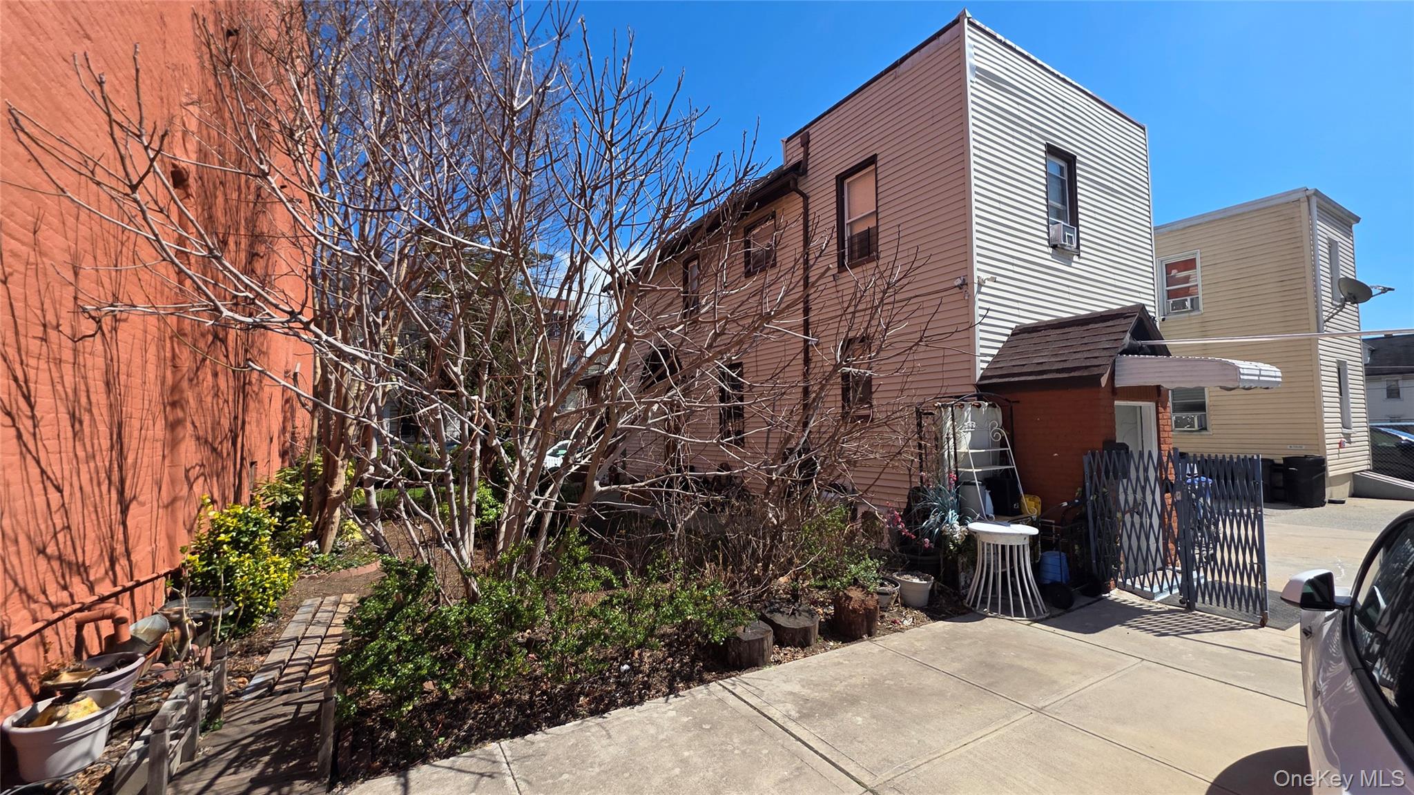 37-54 99th Street Queens, NY 11368 - Photo 18 of 18 a view of a house with a backyard