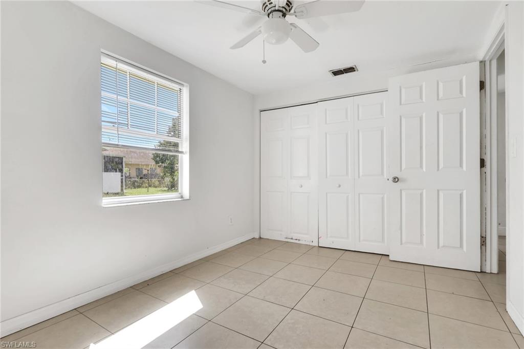 5326 Dixie Drive Naples, FL 34113 - Photo 15 of 25 a view of an empty room with a window