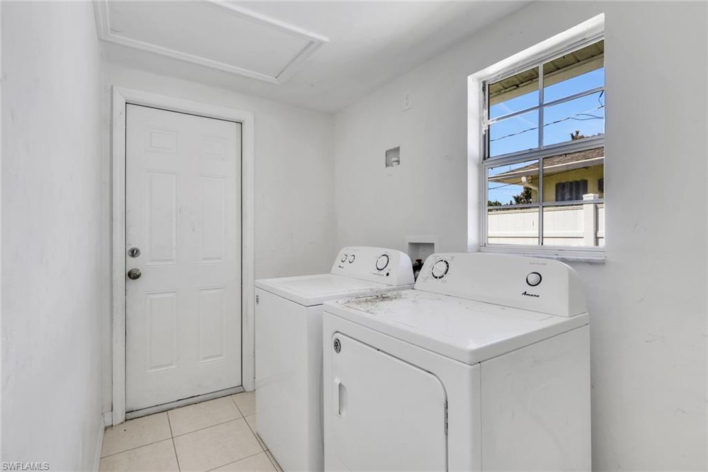5326 Dixie Drive Naples, FL 34113 - Photo 20 of 25 a utility room with dryer and washer